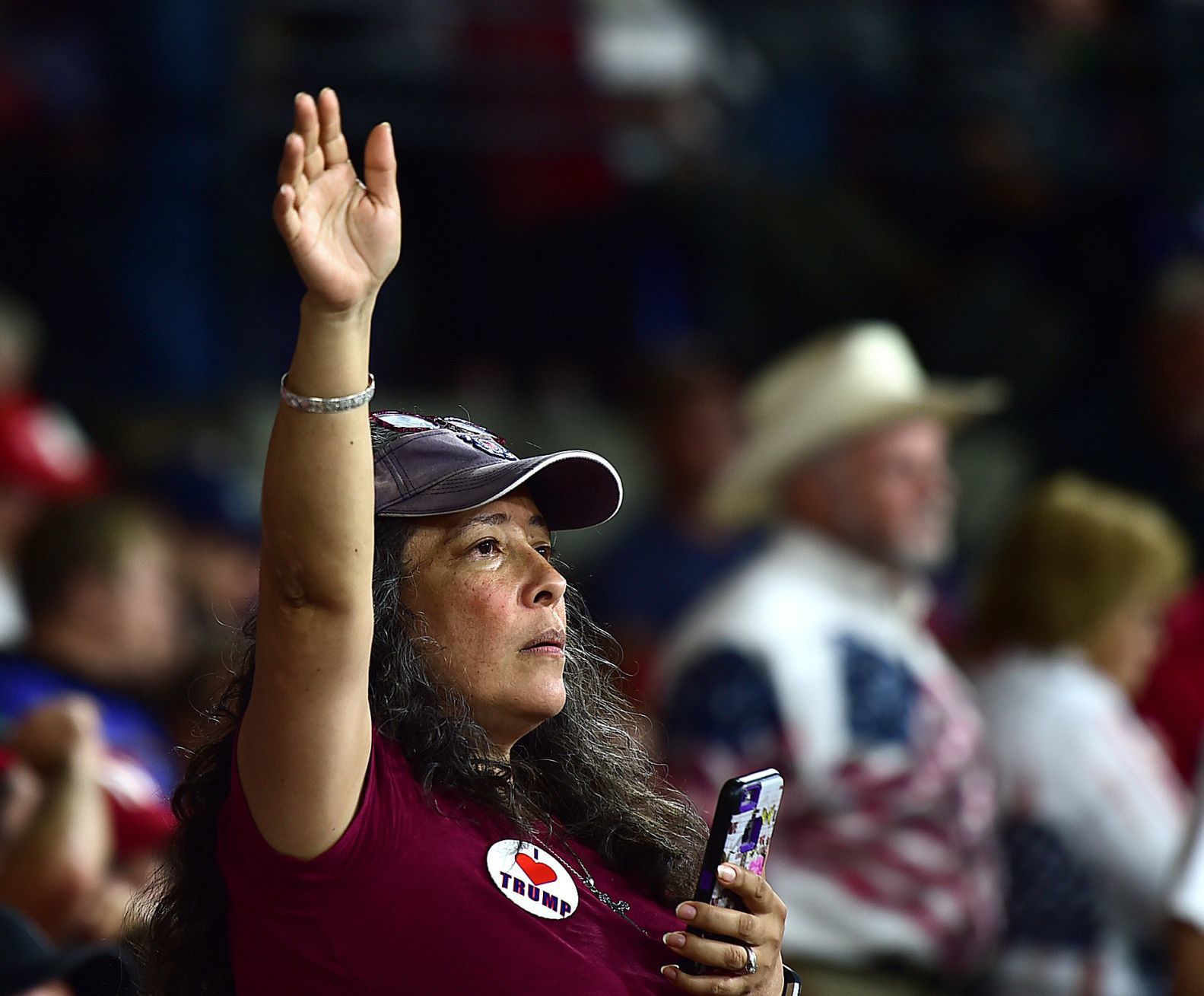 A woman waves